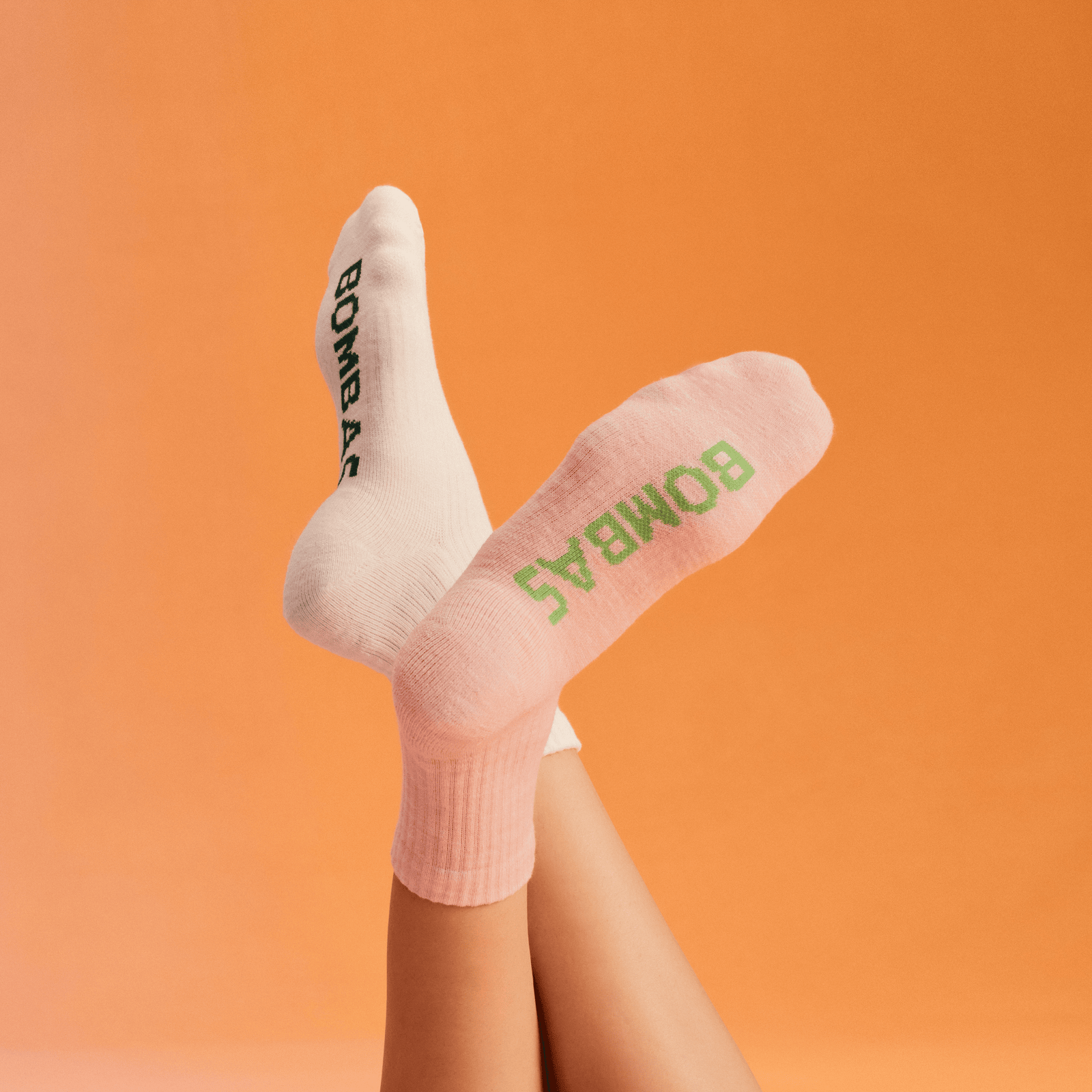 official-bombas::10393-pinkshadow-softwhite-adult-female-onmodel-0-transparent.png
