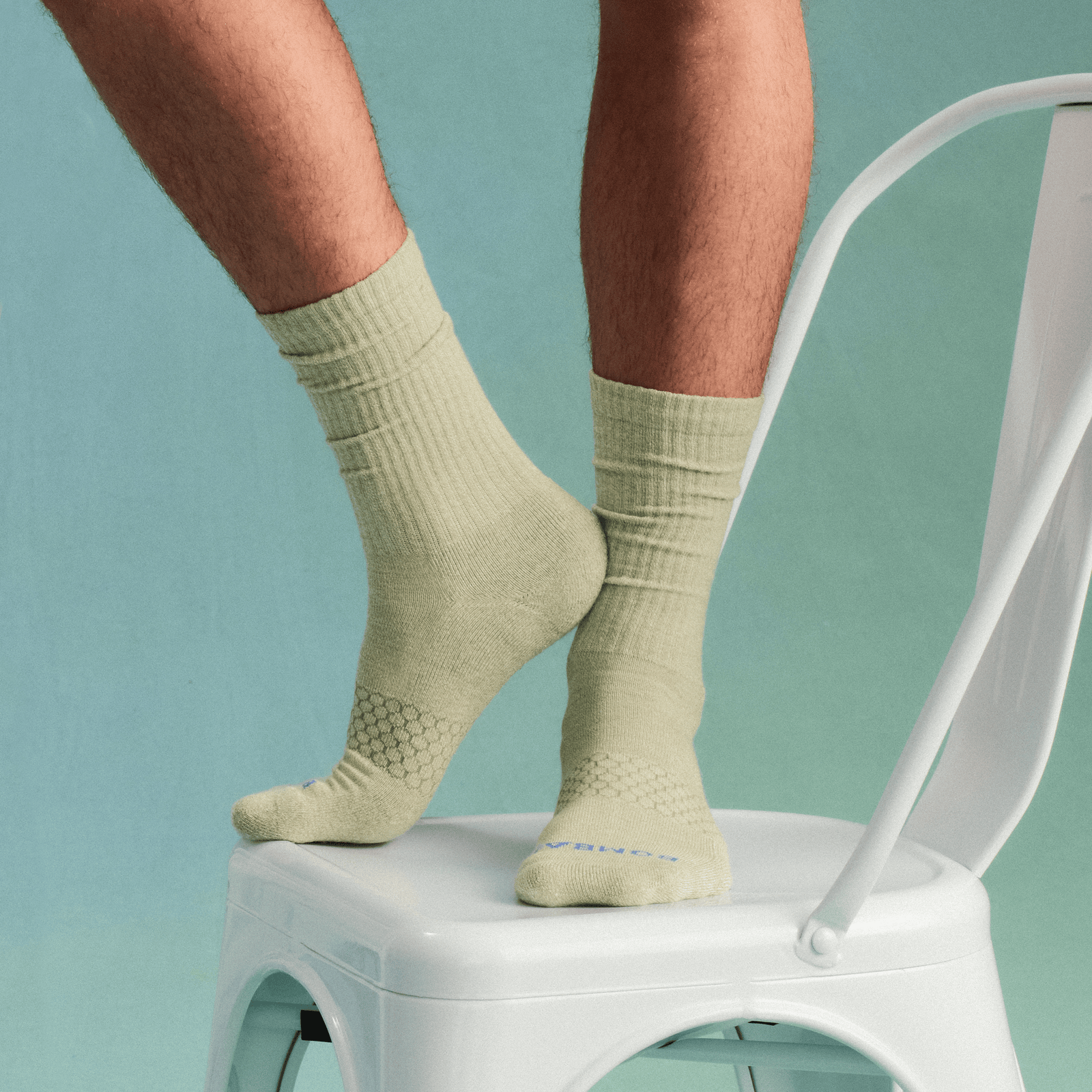 official-bombas::3129-olivebranch-islandblue-adult-male-onmodel-0-transparent.png