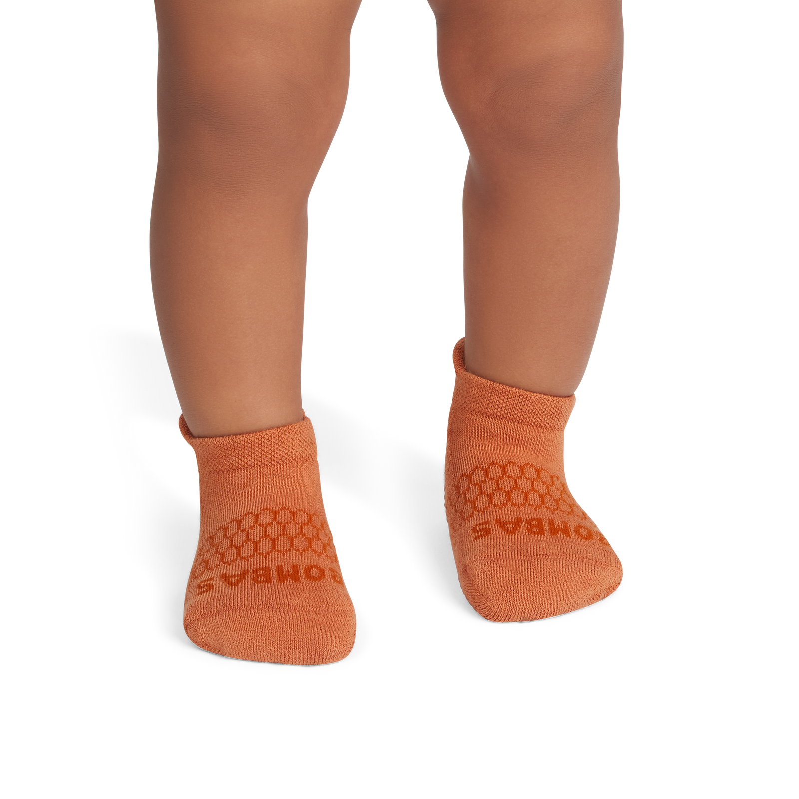 official-bombas::3870-adobe-richcopper-toddler-unisex-onmodel-2-transparent.png