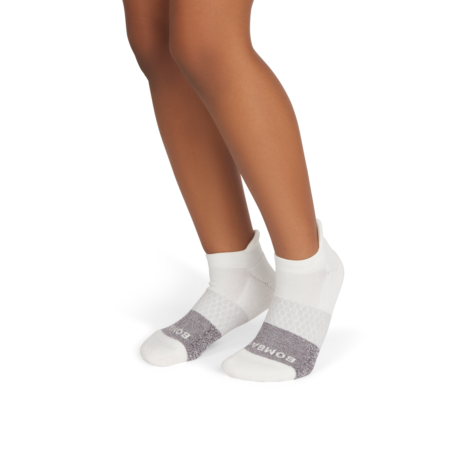 official-bombas::9965-softwhite-charcoal-youth-unisex-onmodel-2-transparent-_1_.png